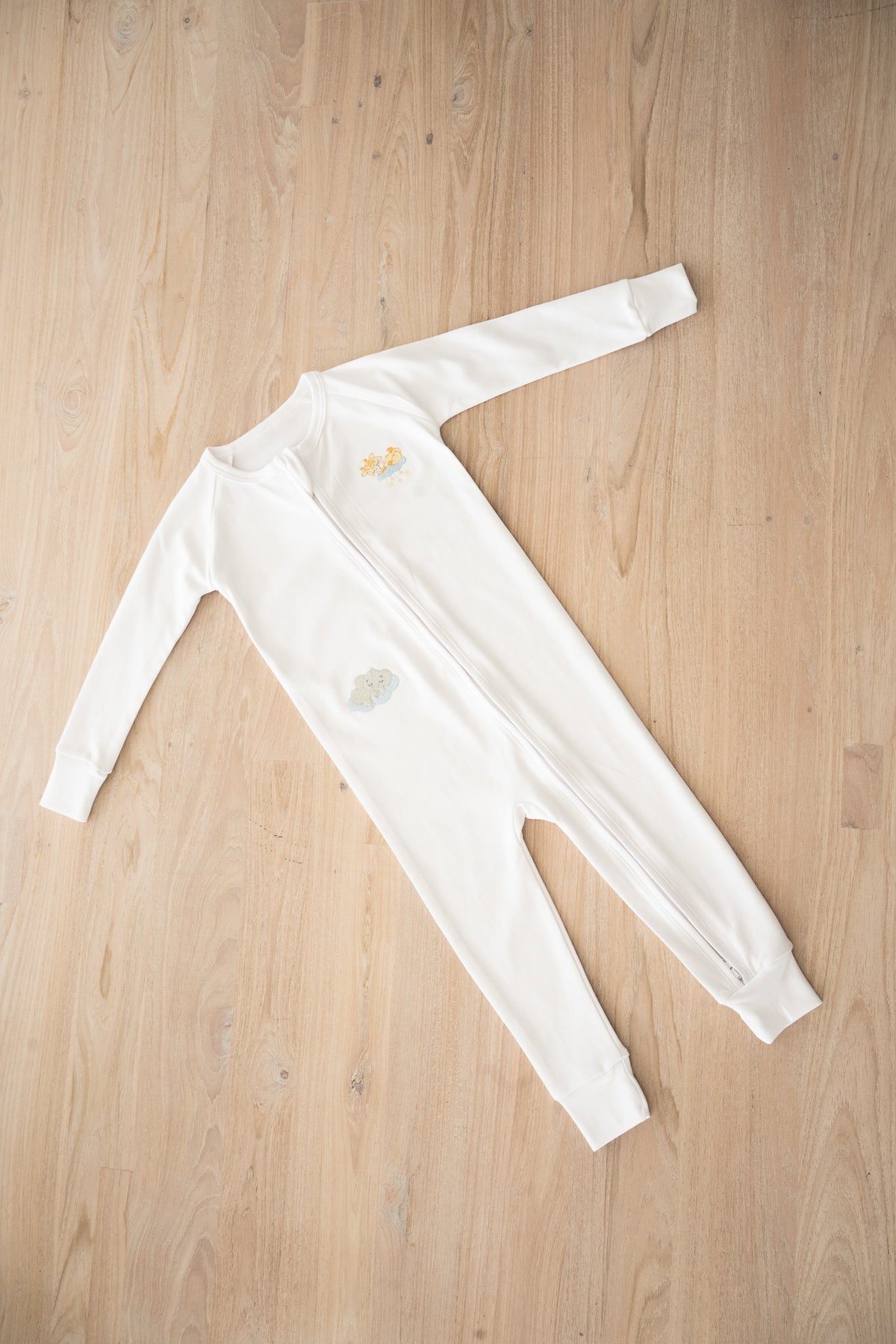Double-zip Peruvian Pima cotton baby sleeper with giraffe and elephant embroidery by Pipa & Pierre