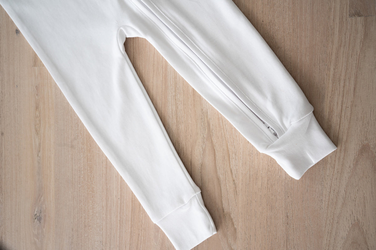 Double-zip Peruvian Pima cotton baby sleeper with giraffe and elephant embroidery by Pipa & Pierre