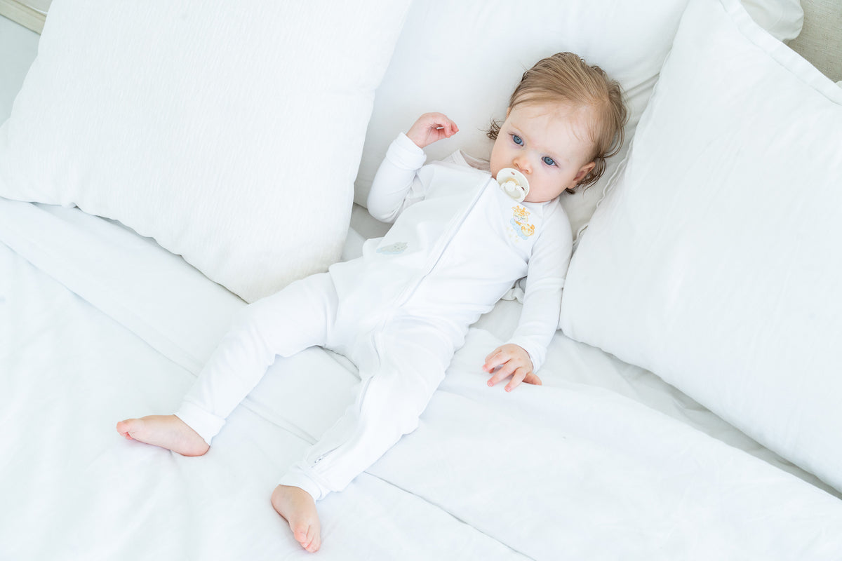 Double-zip Peruvian Pima cotton baby sleeper with giraffe and elephant embroidery by Pipa & Pierre