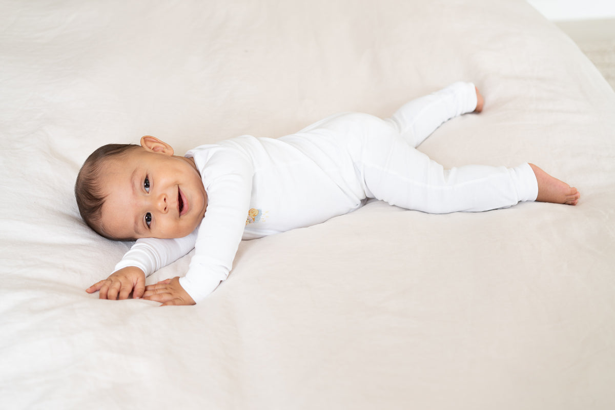 Double-zip Peruvian Pima cotton baby sleeper with giraffe and elephant embroidery by Pipa & Pierre