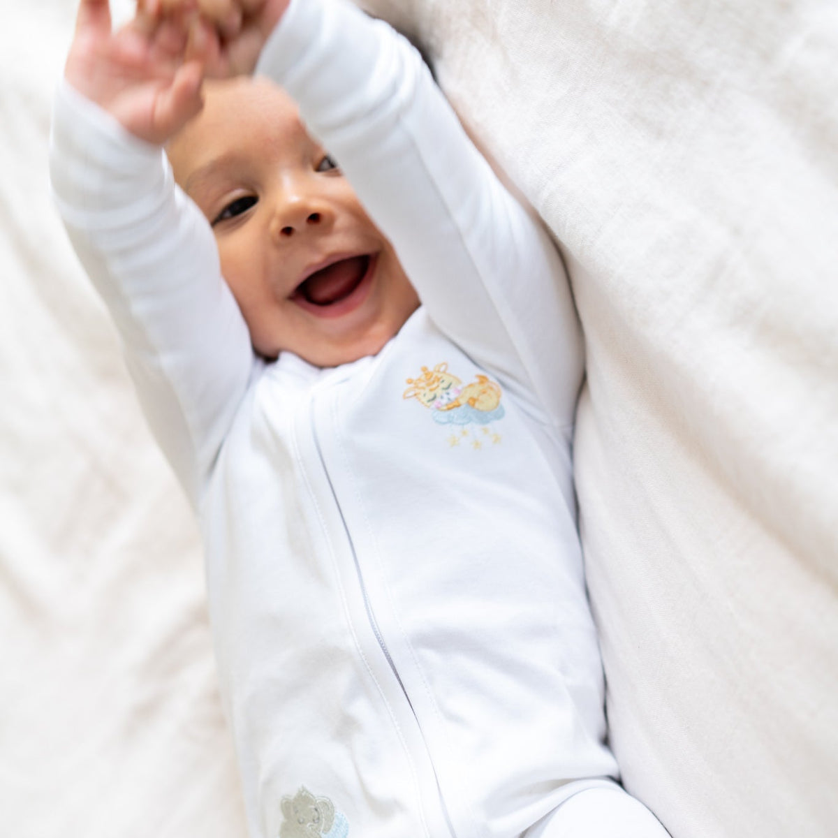 Double-zip Peruvian Pima cotton baby sleeper with giraffe and elephant embroidery by Pipa & Pierre
