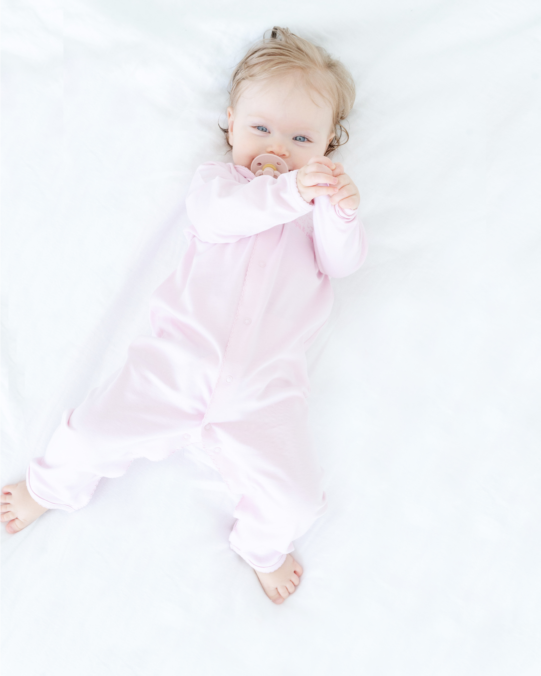 Pastel pink Peruvian Pima cotton baby sleeper with Peter Pan collar by Pipa & Pierre